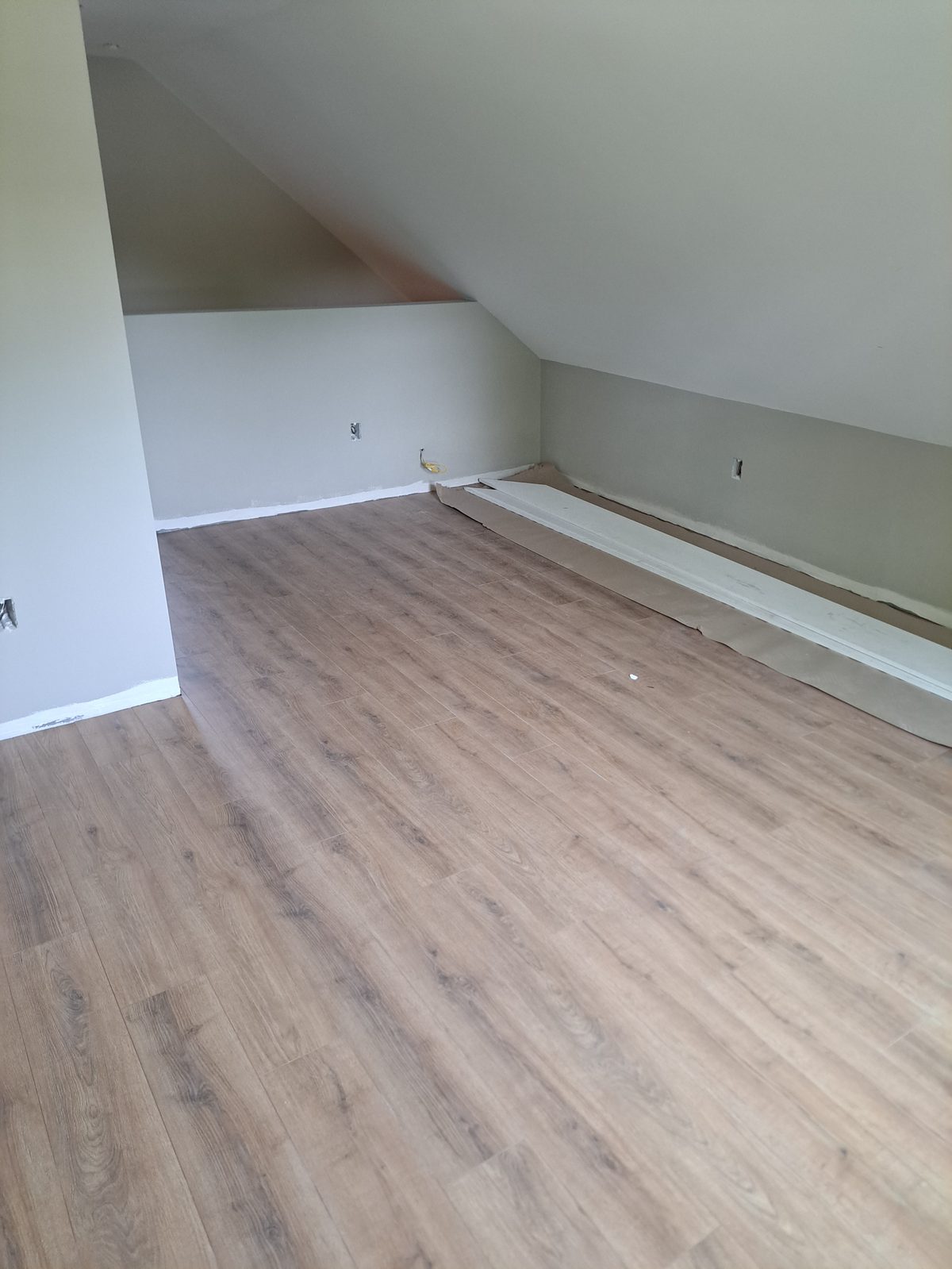 After — finished attic flooring and walls in Sutton, MA