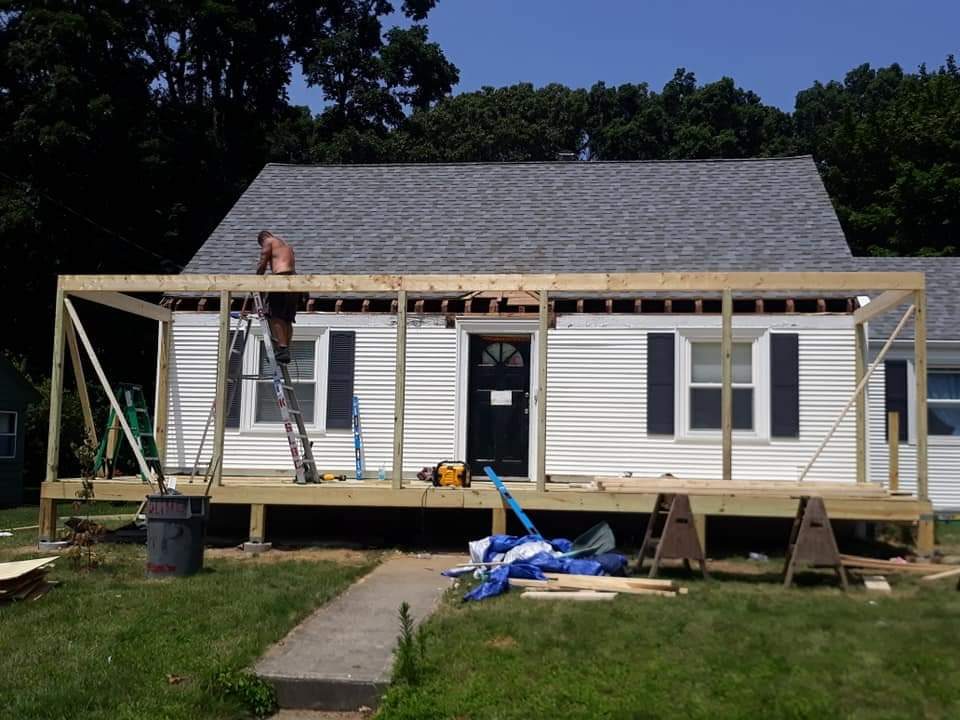 Before — front porch timber frame during deck building in Sutton, MA