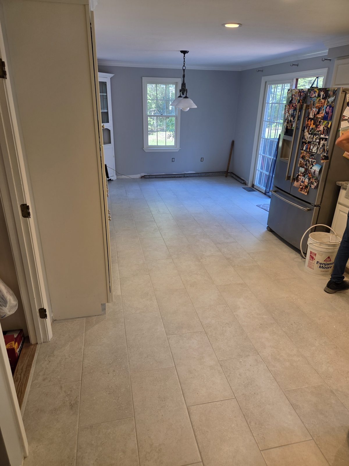 After — new tile flooring in a Sutton, MA kitchen and dining area