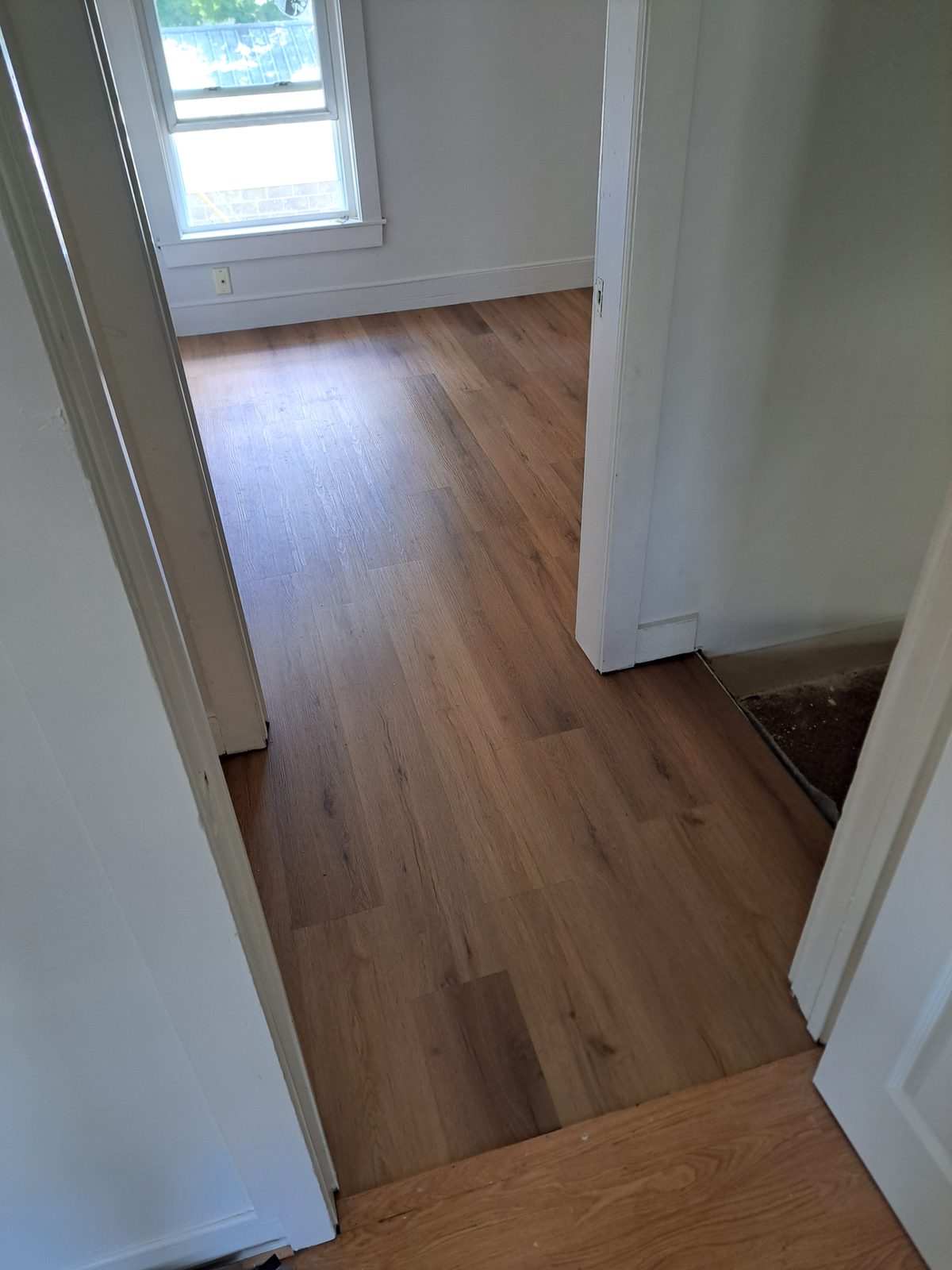 After — new plank flooring installed in Sutton, MA