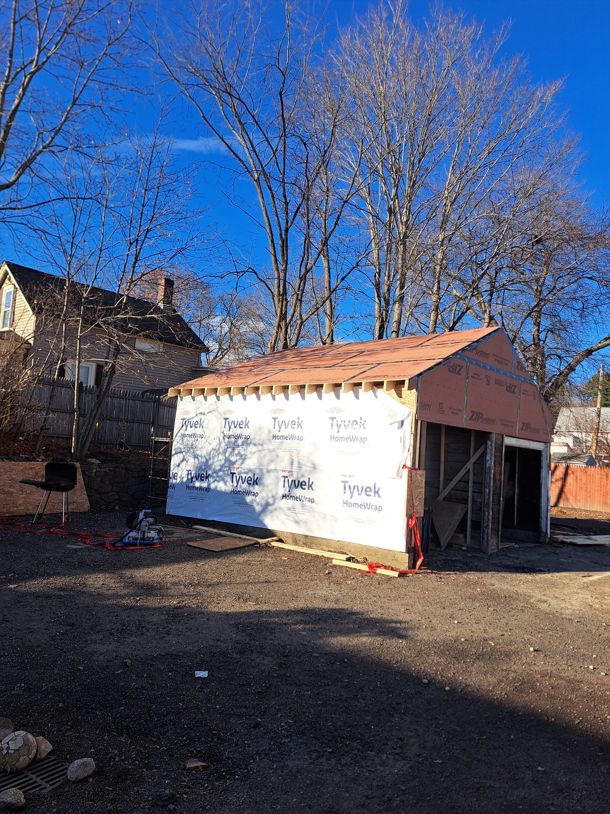 Before — garage ZIP System sheathing and house wrap in Worcester County, MA