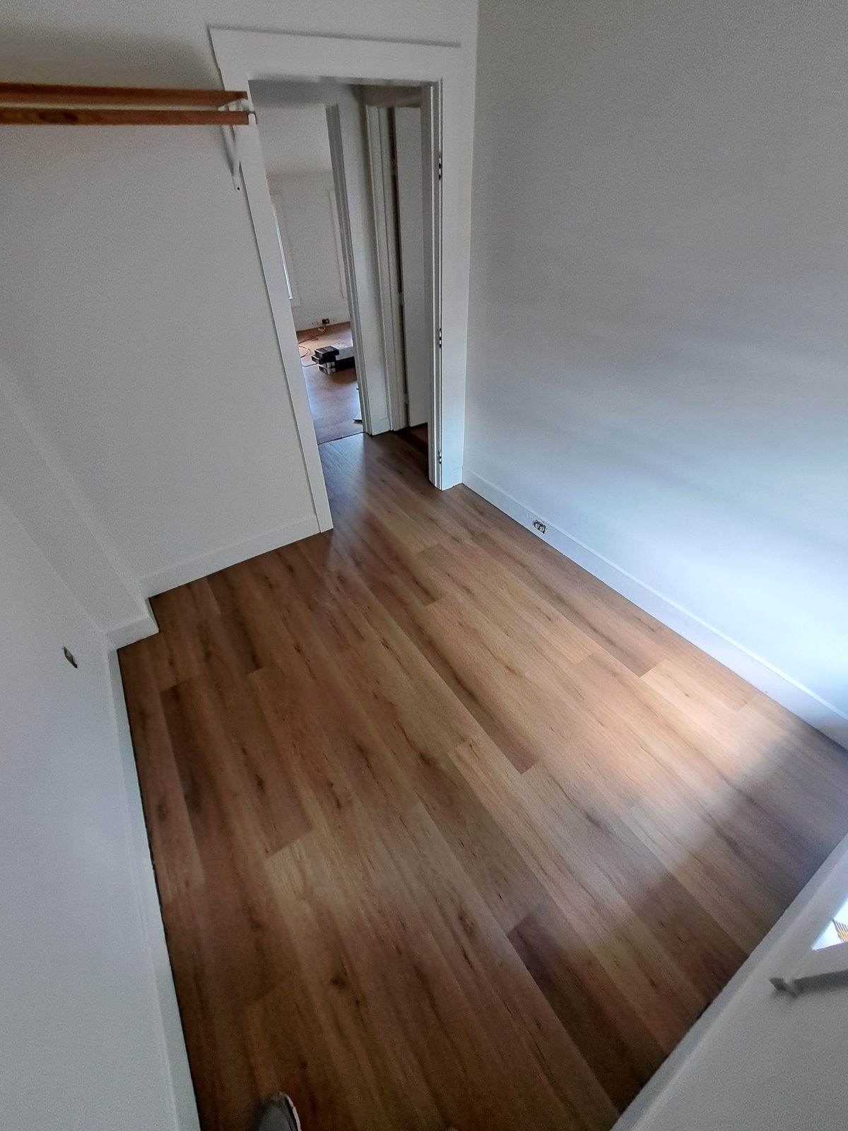 After — remodeled attic room with new flooring in Sutton, MA