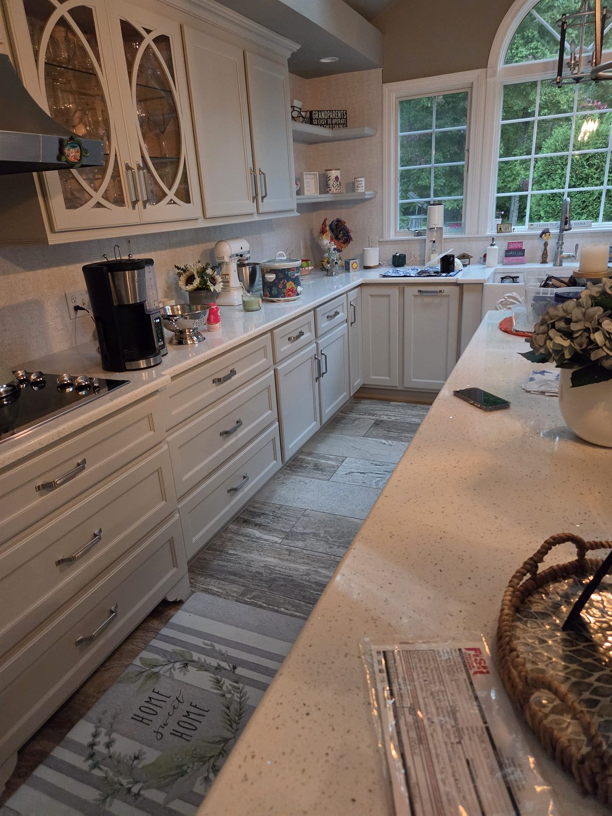 After — white kitchen cabinets and island in a Sutton, MA remodel