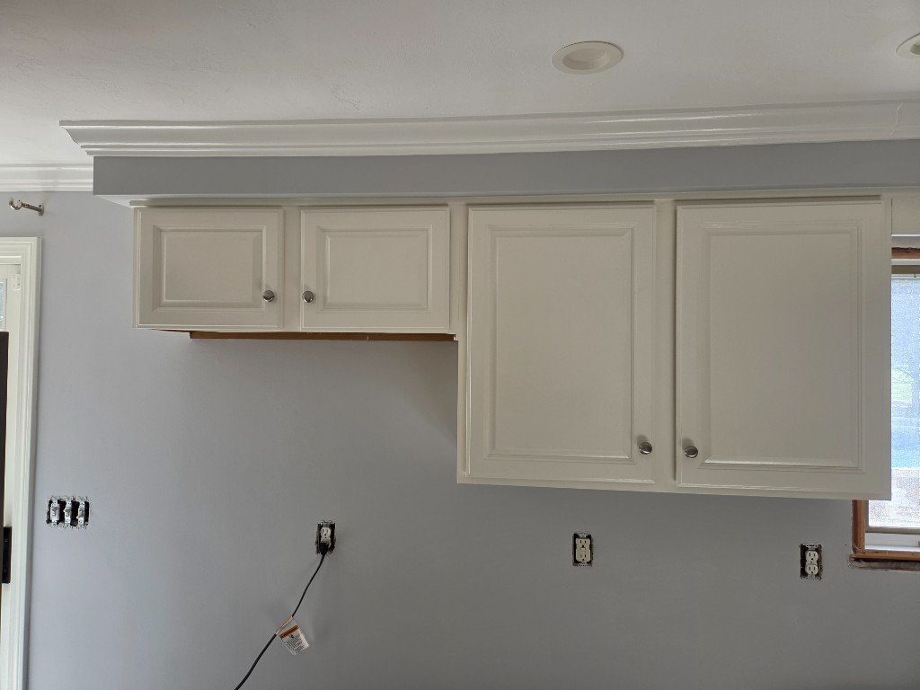 After — white upper kitchen cabinets in a Sutton, MA kitchen remodel
