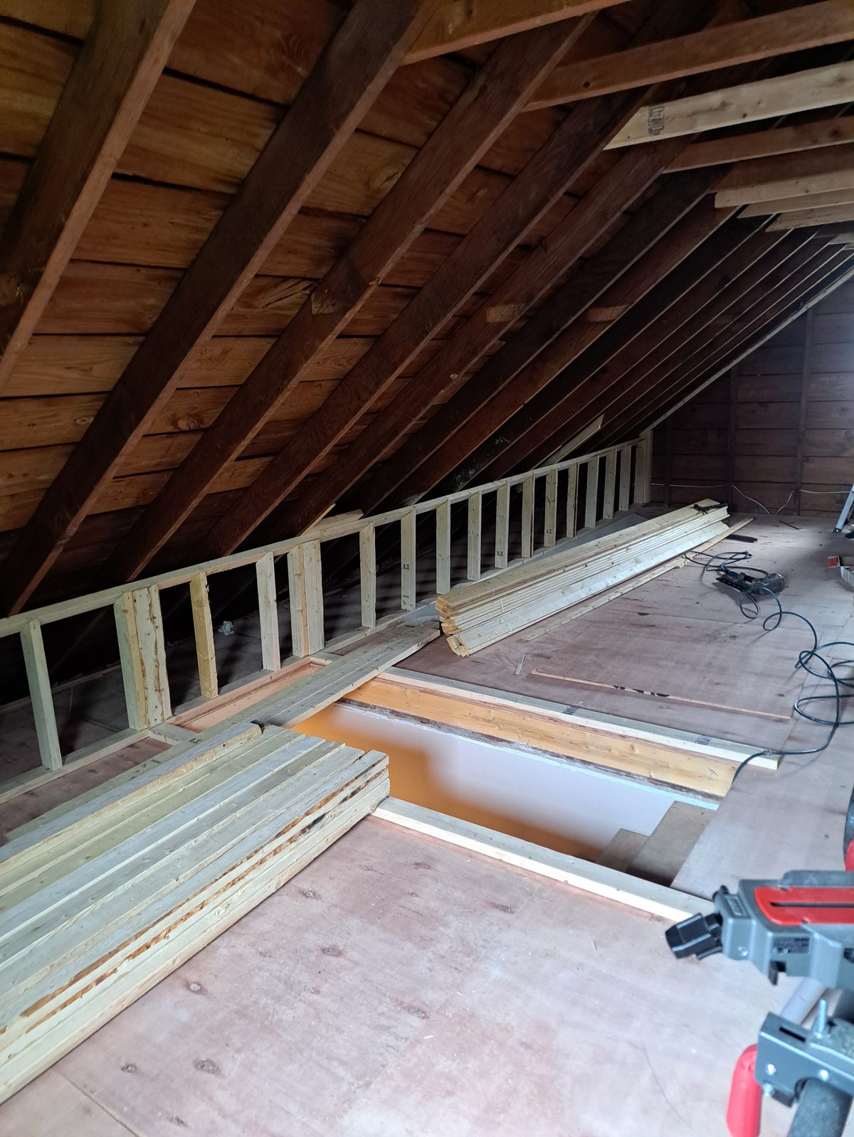 Before — attic floor joists on an old construction remodel in Sutton, MA