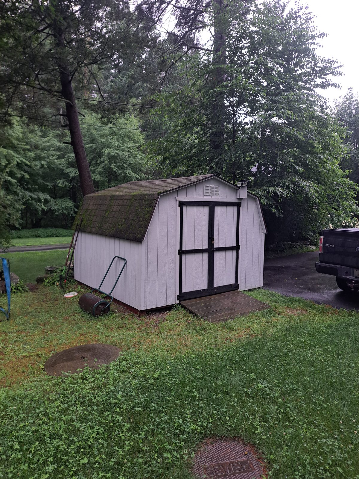 Before — shed roof shingles prior to reroofing in Sutton, MA