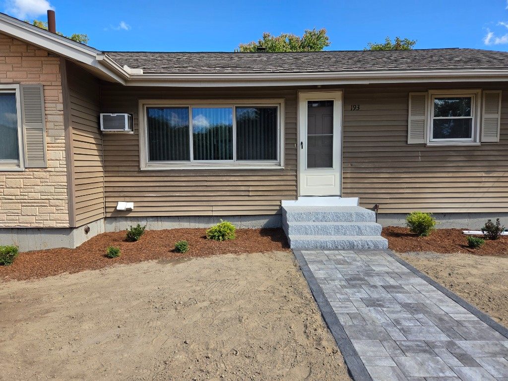 Before — siding, granite steps, and front walkway in Sutton, MA