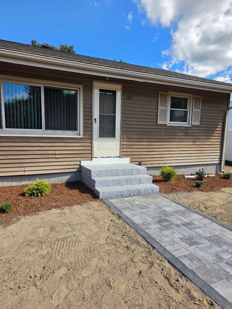 Before — siding and granite steps at a side entry in Sutton, MA