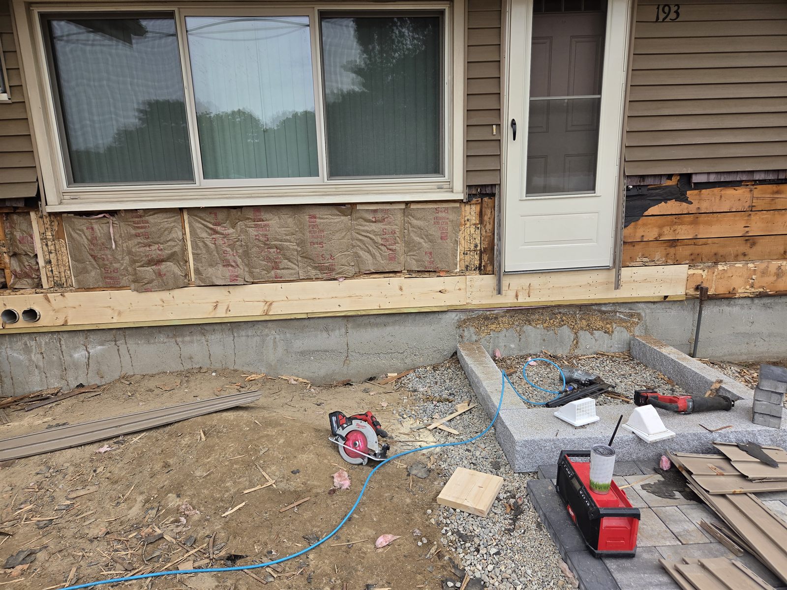 Before — new bottom plate and sheathing during siding repair in Sutton, MA