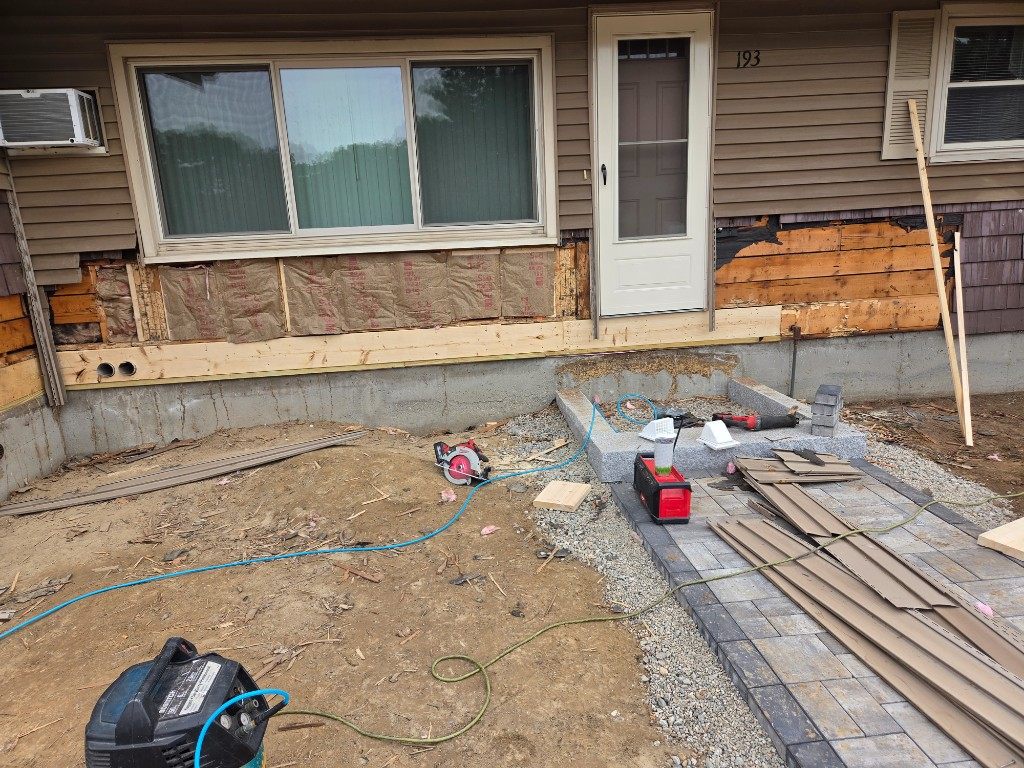 Before — sheathing and a new bottom plate during exterior wall repair in Sutton, MA