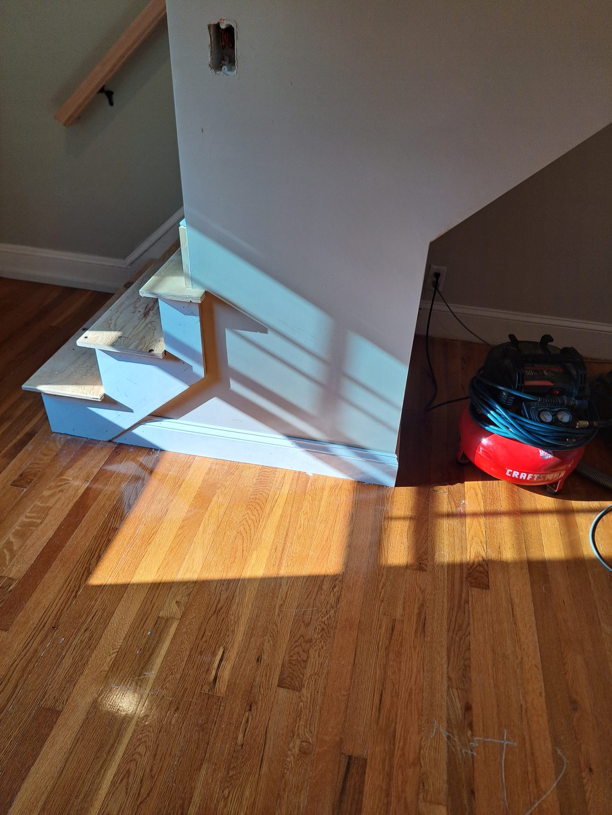After — finished hardwood stairs by general contractor Sutton, MA